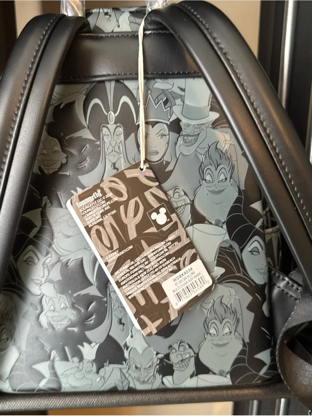 Loungefly Disney Villains AOP Debossed Backpack NWT